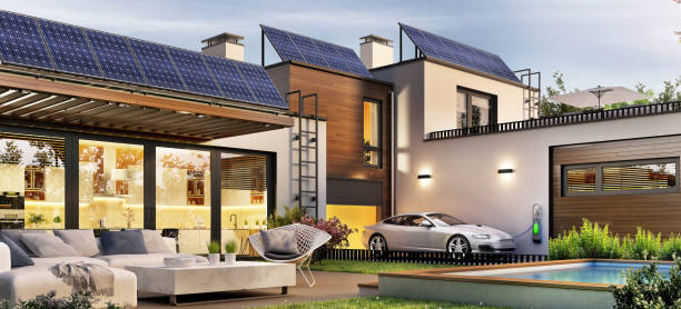 istock House with solar panels and electric car 1476182048