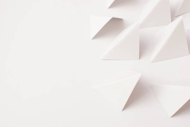 istock White background with 3d triangle shapes, close up 1476188447