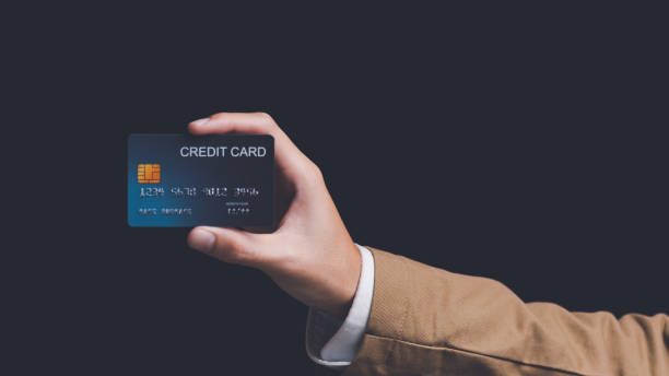 istock Consumers use credit cards to conduct financial transactions, payment with wireless communication technology,Digital money transfer,Online payment shopping,digital banking and online payment concept 1476191277