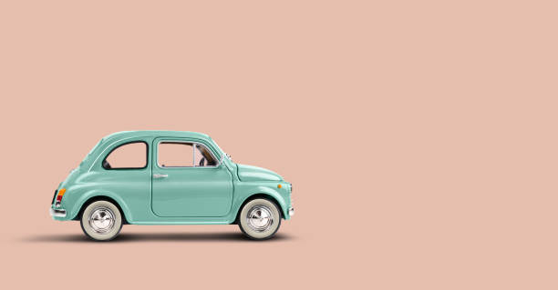 istock Miniature retro toy car on coral pink background with copy space 1476192705
