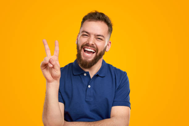 istock Happy man showing peace sign 1476195006