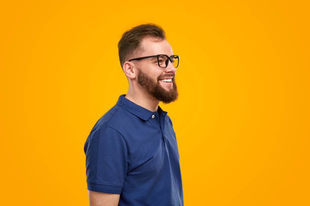 istock Smart happy man in glasses in studio 1476195018