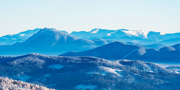 Velky Choc and Low Tatras from Velka Raca hill in winter Kysucke Beskydy mountains stock photo