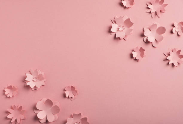 istock Spring composition. Paper flowers on pink pastel background 1476196466