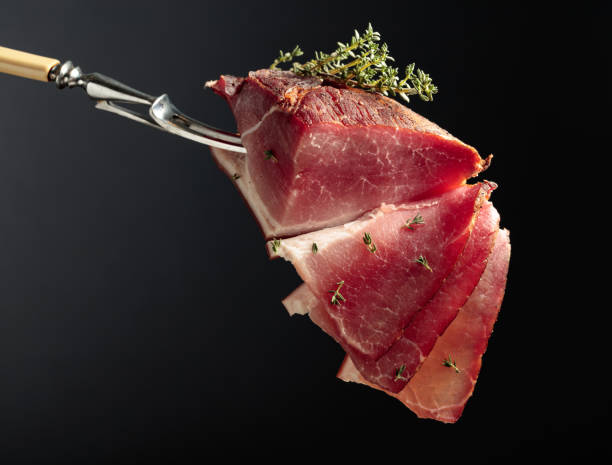 istock Dry-cured pork fillet with thyme. 1476198798