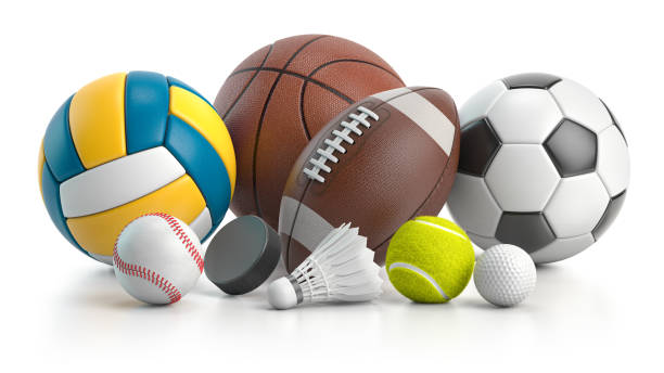 Different sport balls and equipment. Soccer, ffotball, basketball, handball rugby and volleyball balls, hockey puck and badminton shuttlecock isolated on white. stock photo