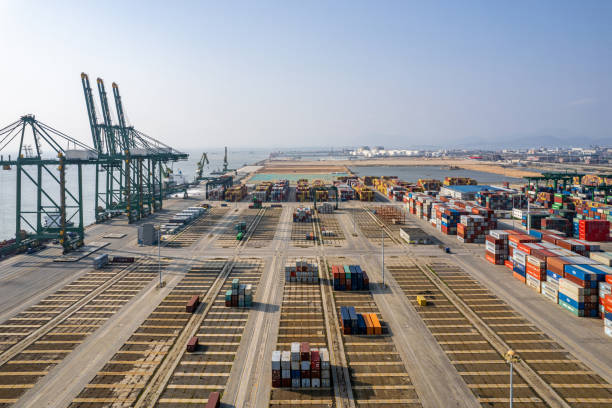 istock Containers stacked in international freight port 1476199193