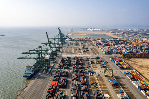 istock Aerial view of container cargo international port 1476199231
