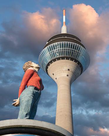 Düsseldorf, Germany - March 2, 2023: Rhine tower against cloudy sky on March 2, 2023 in Dusseldorf, Germany, Europe