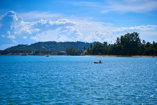 A bay with turquoise sea water on the Thai island of Samui.