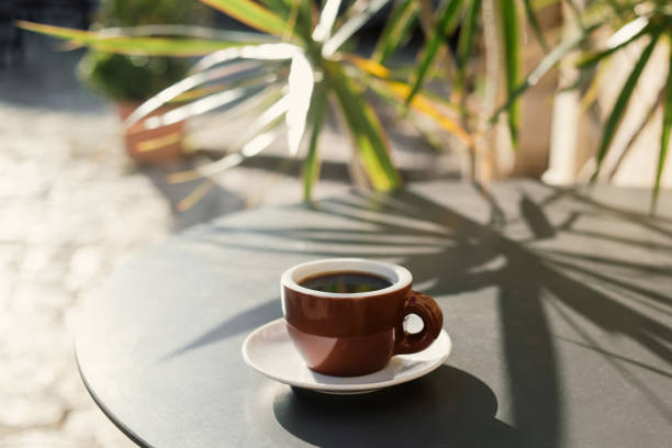 cup of coffee in a cafe outdoor - corfu town stockfoto's en -beelden