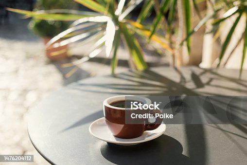 istock Cup of coffee in a cafe outdoor 1476204112