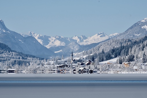 The Weissensee is a lake in the Austrian state of Carinthia with the Gailtal Alps mountain range.