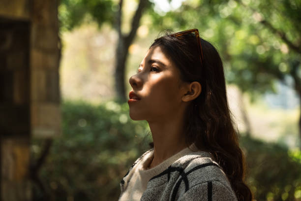 istock Sentimental young lady being outdoor 1476221525