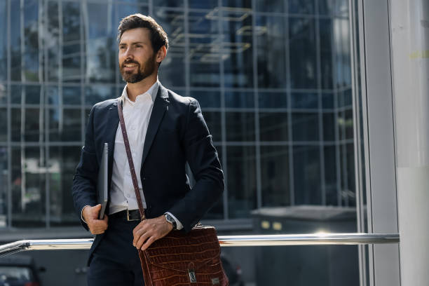 istock Bearded man in a stylish suit looking confident 1476222898