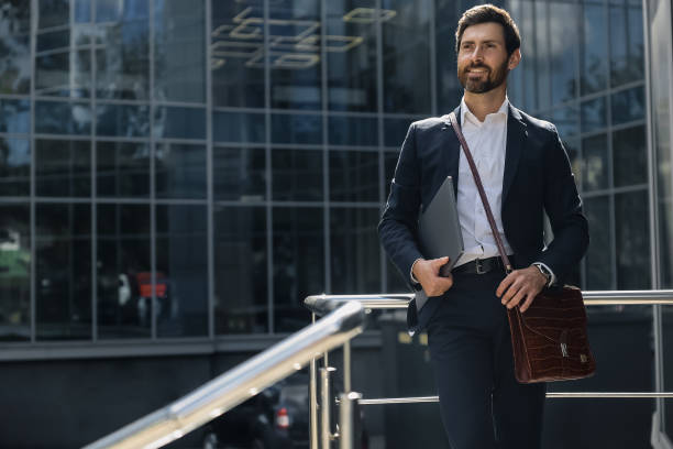 istock Bearded man in a stylish suit looking confident 1476222899