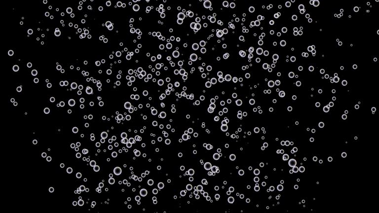 Rising white bubbles (black background) Soap bubbles