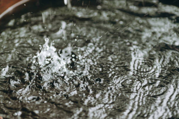 istock Somebody is pouring some water in the bucket. 1476234230