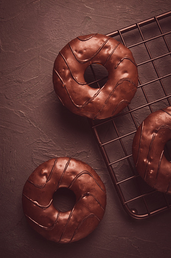 donuts with cocoa, in chocolate glaze, top view, no people,