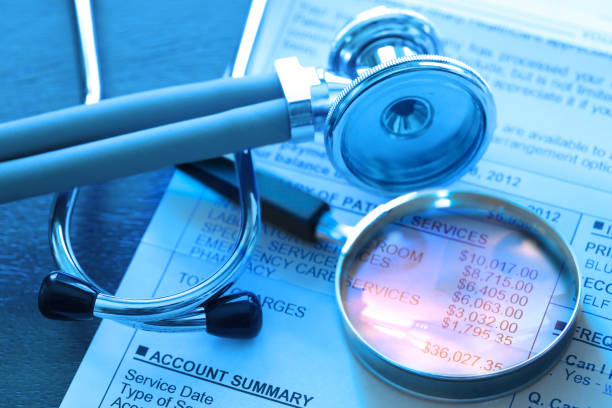 istock Magnifying Glass On Medical Invoice 1476235688
