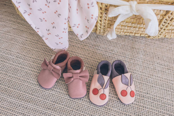 istock Baby basket and shoes 1476242444