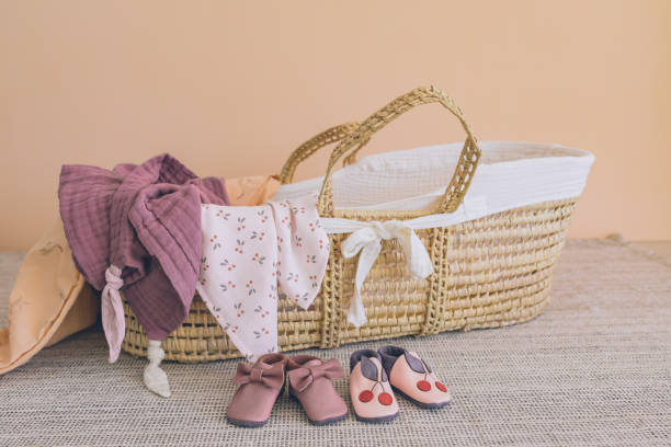 istock Baby basket and shoes 1476242452