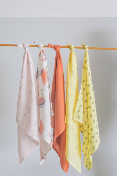 istock Baby blankets hanging on rack 1476242737