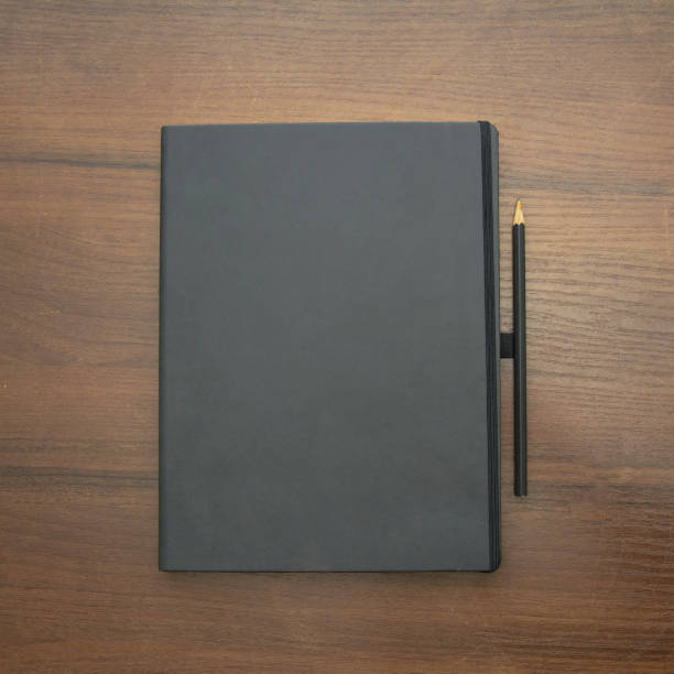 istock A beautiful pencil lies on a large notebook 1476245476