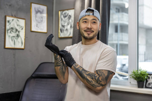 istock Young asian man putting on gloves 1476245729