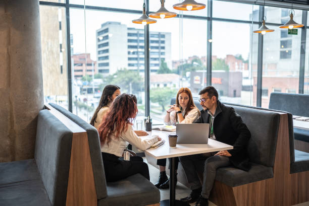 istock Coworkers having a meeting in the office 1476250630