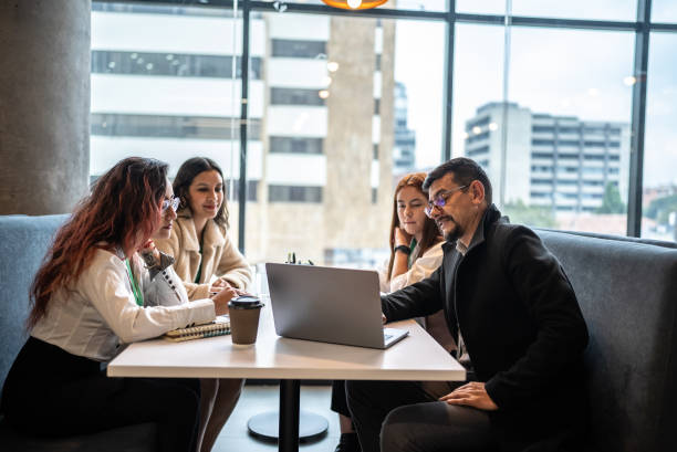 istock Coworkers having a meeting in the office 1476250641
