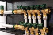 new gas pipeline system with green valves indoors