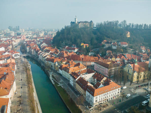 istock Drone view of old city and river 1476258550