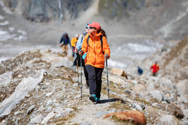 istock Friends trekking in mountains 1476261218