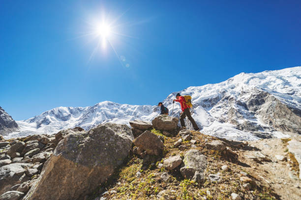 istock Father and son trekking in mountains 1476262614