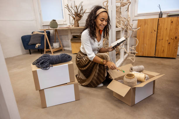 istock Woman checking the products in a packed boxes 1476267466