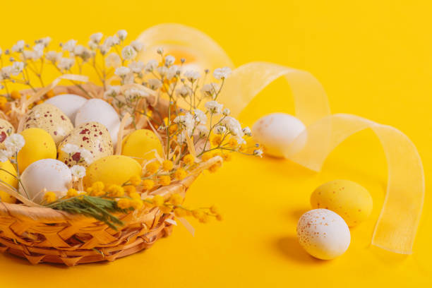 istock Easter candy chocolate eggs and almond sweets lying in a bird's nest 1476269616