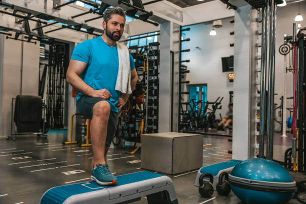 istock Man with towel in the gym after the workout 1476271045
