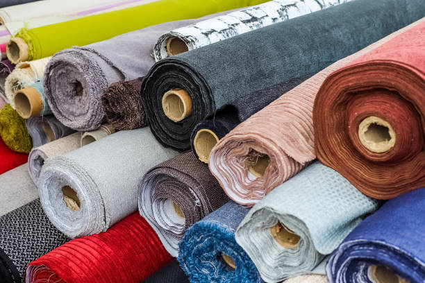 istock View on samples of cloth and fabrics in different colors found at a german fabrics market. 1476272309