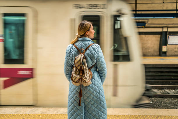 istock Young woman waiting for the subway 1476272424