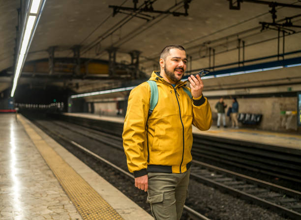 istock Man recording voice message in a subway station 1476272741