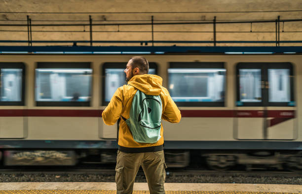 istock Man waiting for the subway 1476273971