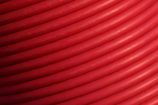 Red electrical wire background with copy space