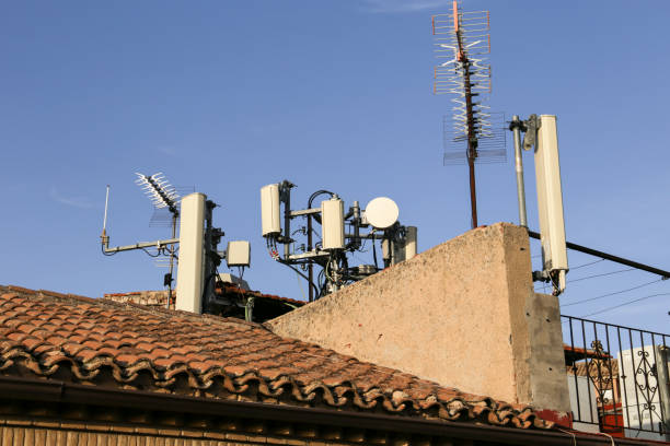 istock Mobile phone antennas on roofs in Spain 1476277922