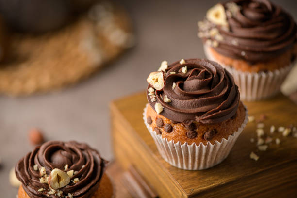 istock Chocolate chip muffins decorated with chocolate ganache 1476279853