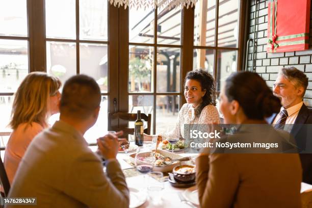 Colleagues Enjoying A Business Lunch Stock Photo - Download Image Now - Lunch, Business Lunch, Team Building