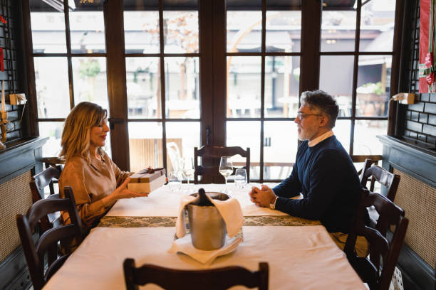 istock Generations of Love: Senior Couple's Special Occasion at Upscale Restaurant 1476286049