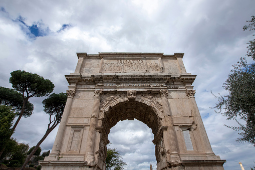 The iconic Arch of Titus on the Via Sacra in the Roman Forum, Rome, Italy