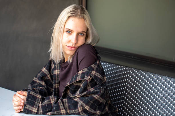 Naturally beautiful young woman looking at the camera