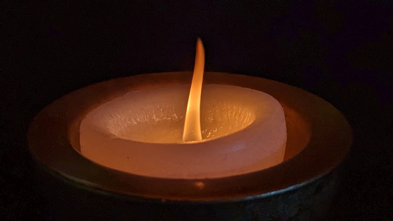 Close up of golden candle